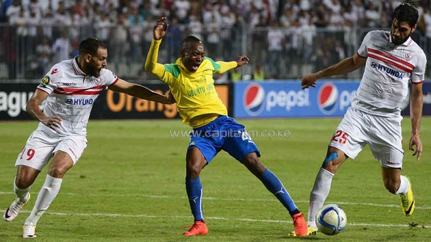 Zamalek's defenders Ahmed Mohamed Abdalla El-Sayed Nouh (L) and Ali Mossad defend against Sundown's Zimbabwean forward Khama Billiat. PHOTO/Guardian