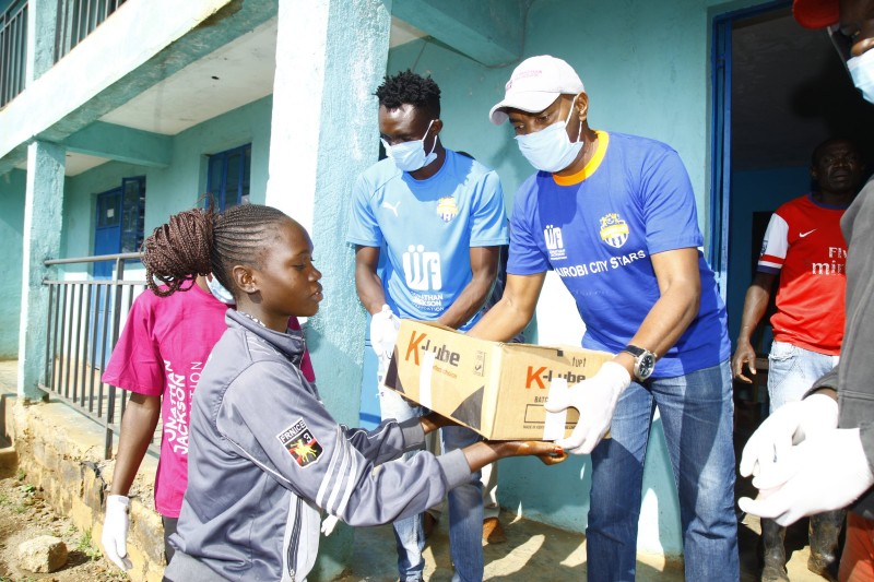 City Stars players, staff donate in Kibera