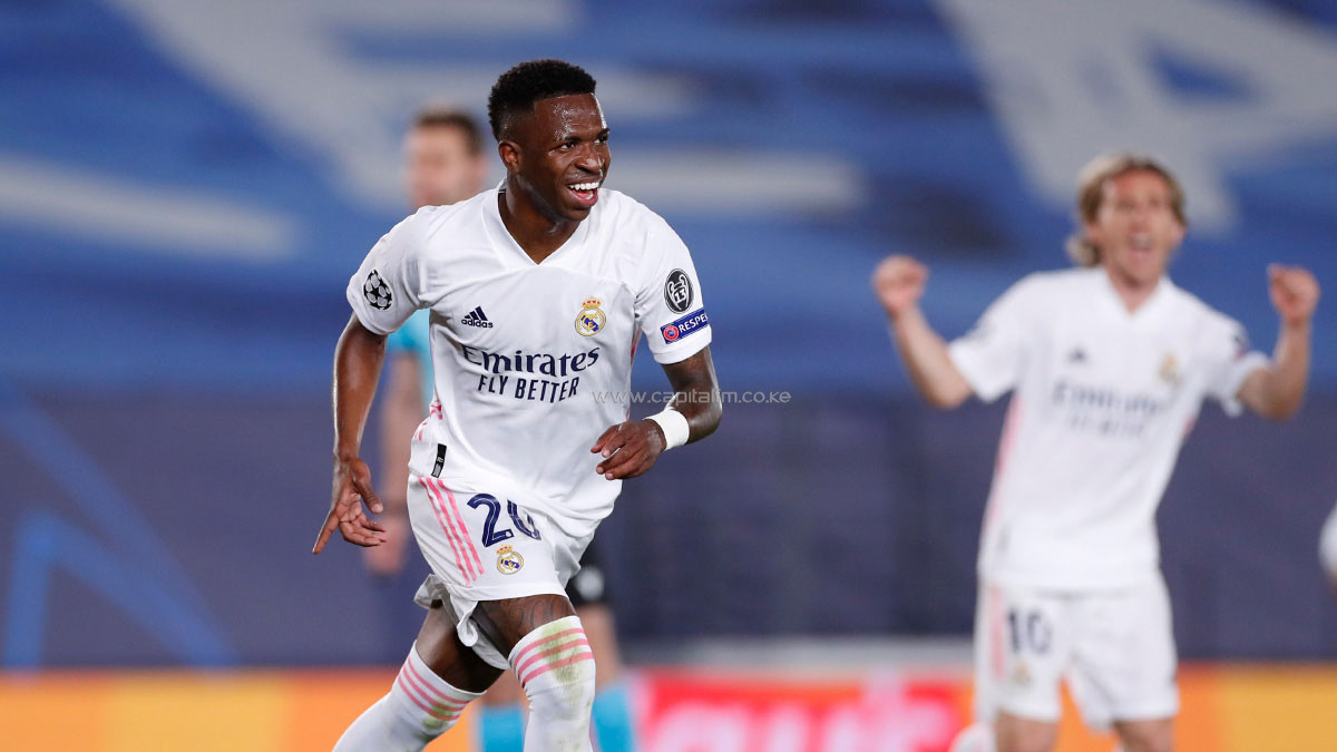 Vinicius Junior on the mark as Real Madrid squeeze into Champions League quarters