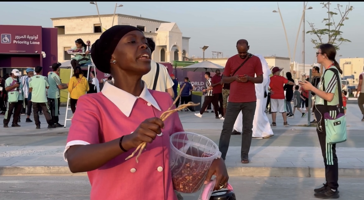 Kenyan comedienne and Odibets Brand ambassador Awinja causes stir selling peanuts and Mukhombero at Al Thumama Stadium