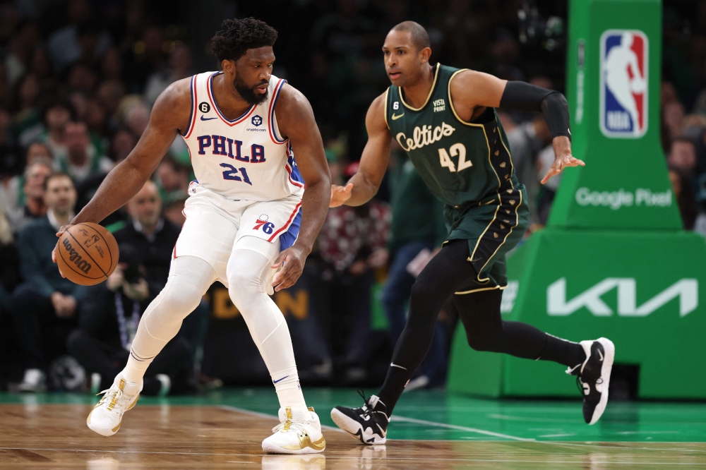 Embiid shines as Sixers sink Celtics, Nuggets rout Suns