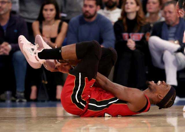 Curry hits 50 as Warriors advance, Butler hurt in Heat win