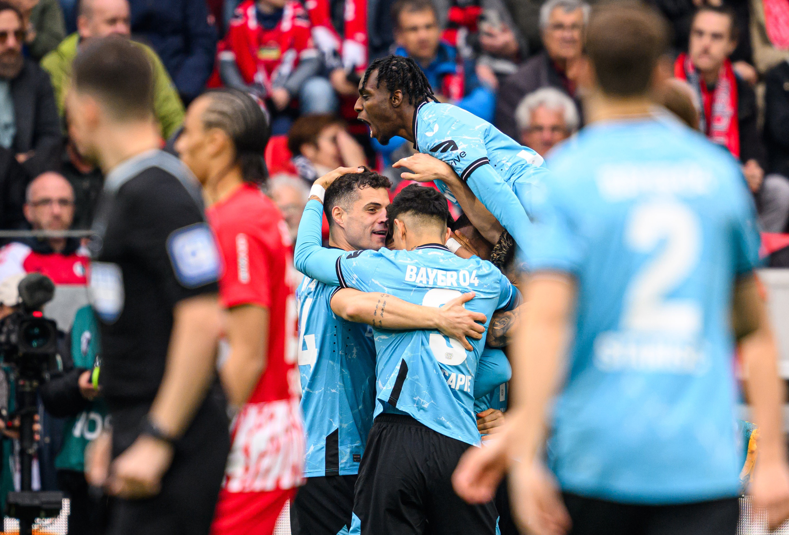 Unbeaten Leverkusen edge closer to German Bundesliga title