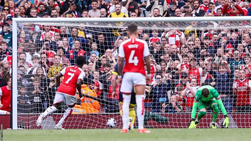 Arsenal cruise past Bournemouth to go four points clear
