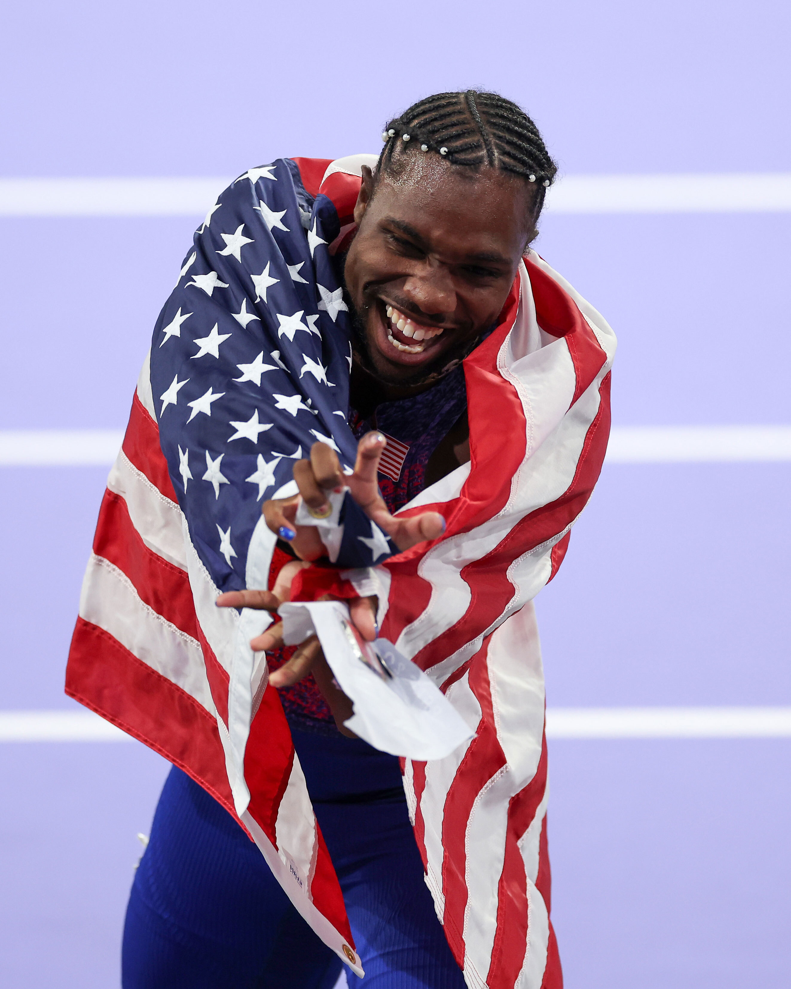 Lyles wins sensational 100m gold by just 0.005 seconds