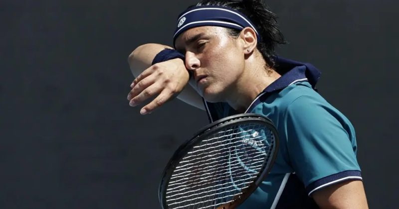 Australian Open: Tearful Jabeur overcomes breathing problems to win