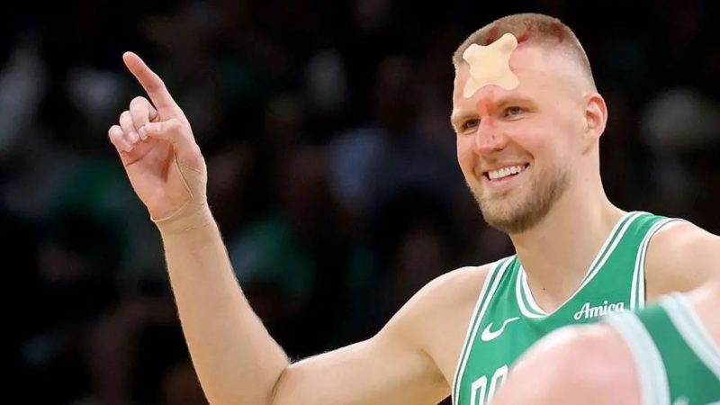 NBA Play-offs: Porzingis suffers head wound as Celtics beat Magic